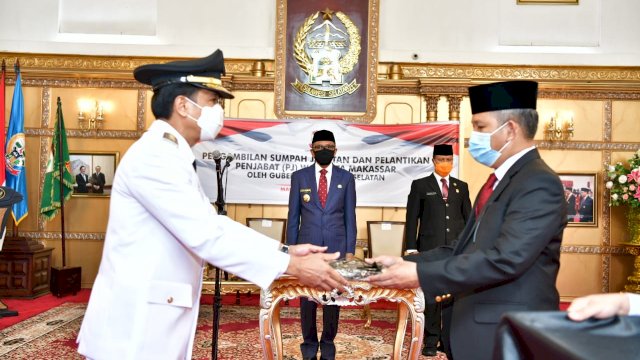 Serah terima Jabatan dari Pj Wali Kota Makassar sebelumnya Prof. Yusran Yusuf ke Pj Wali Kota yang Baru Prof. Rudy Djamaluddin, Jumat (26/06/2020).
