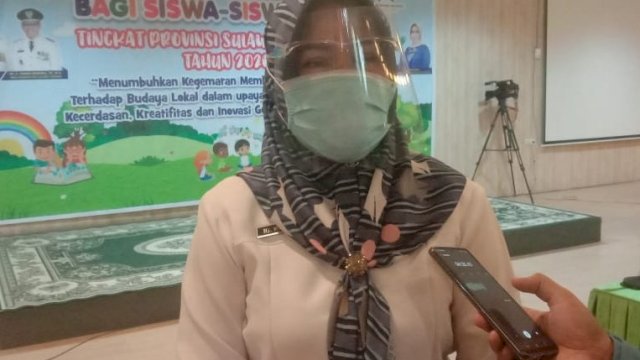 Plt. Kadis Perpustakaan dan Kearsipan Daerah, Ir. Hj. Wagola, M.Si.