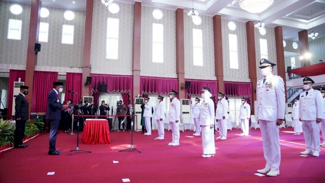 Pelantikan 11 Kepala Daerah di Sulsel Hasil Pilkada Serentak 2020 di Baruga Karaeng Pattingalloang Kompleks Rumah Jabatan Gubernur Sulsel, Jumat (26/02/2021).