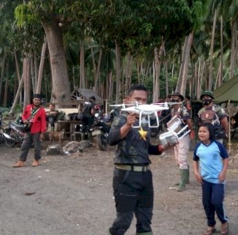 Kegiatan TMMD 111 Kodim Selayar Jadi Hiburan Anak-anak di Kampung Tola
