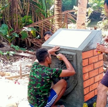 Satgas TMMD 111 Selayar Bangun Tugu di Titik 3000 Meter Jalan Rintisan Bitombang-Kampung Tola