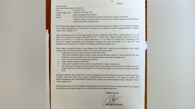 Surat Sanggahan Kepala Seksi Pelayanan Kantor Desa Topejawa Nurjayanti.
