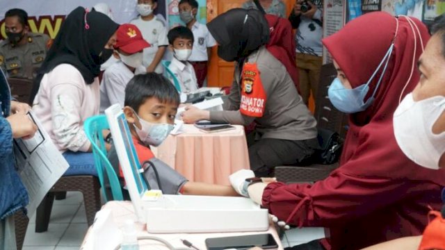 Pelaksanaan vaksinasi di SDN VI Bontokamase, Kecamatan Somba Opu, Kabupaten Gowa, Selasa (22/02/2022). (Istimewa)