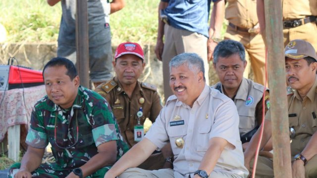 Bupati Pinrang Andi Irwan Hamid, bersama Komandan Kodim 1404 Pinrang Letkol Inf. Aris Barunawan, menghadiri Pesta panen masyarakat Desa Batulappa Kecamatan Batulappa, Senin (06/06/2022). (Istimewa)