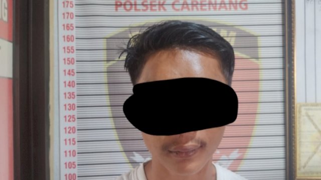 SB (22) Pelaku Curanmor kini diamankan di Polsek Carenang, Kabupaten Serang, Banten.(Foto: Istimewa)