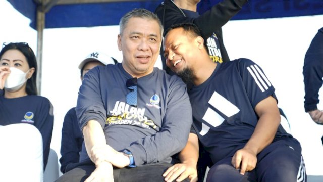 Gubernur Sulsel Andi Sudirman Sulaiman, bersama Wakil Ketua DPP Paetai Nasdem Ahmad Ali, saat mengikuti Jalan Sehat Partai Nasdem. (Istimewa)