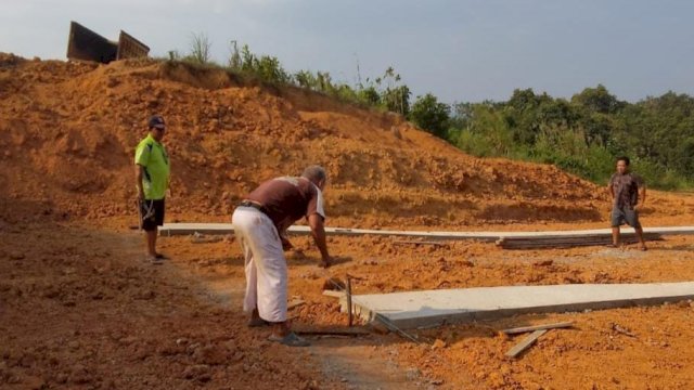 Kondisi pembangunan jalan di Desa Muara Leka Bangkit. (Istimewa)