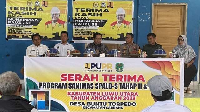Prosesi serah terima program SANIMAS SPALD-S dan PISEW yang digelar di sela-sela kegiatan reses Muhammad Fauzi di Desa Buntu Torpedo, Kecamatan Sabbang, Luwu Utara, Rabu (27/12/2023). (Foto: Istimewa)