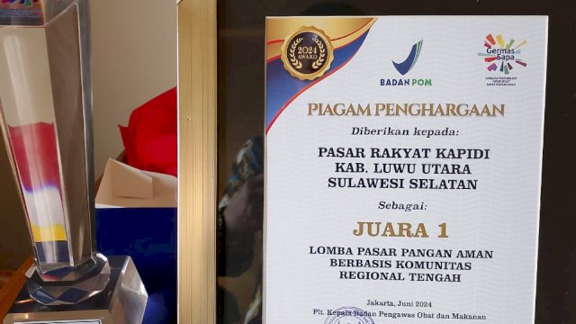 Piagam penghargaan juara 1 Pasar Rakyat Desa Kapidi Luwu Utara. (ist)