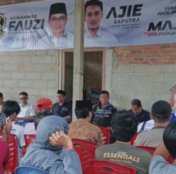 Guyuran Hujan Tak Surutkan Antusias Warga Marobo Hadiri Kampanye Fauzi-Ajie