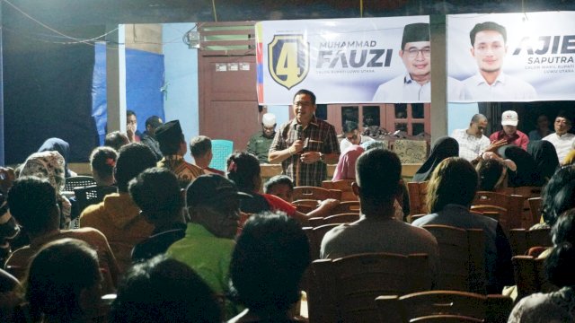 Pasangan calon bupati dan wakil bupati Luwu Utara, Muhammad Fauzi-Ajie Saputra saat bersilaturahmi dengan warga Dusun Walu-Walu, Desa Bakka, Kecamatan Sabbang, Luwu Utara, Sabtu (19/10/2024). (Foto: Istimewa)