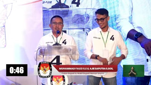 Pasangan Calon Bupati dan Wakil Bupati Luwu Utara, Muhammad Fauzi-Ajie Saputra saat tampil dalam debat terbuka Pilkada Lutra 2024, Kamis (31/10/2024) malam. (Foto: Istimewa)
