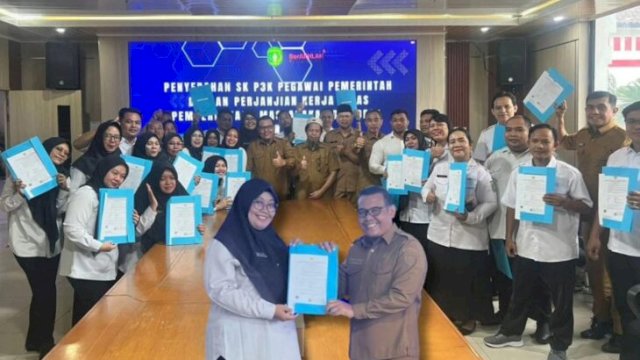 Penyerahan SK Pengangkatan P3K Dilingkup DPMD Kukar. (Istimewa)