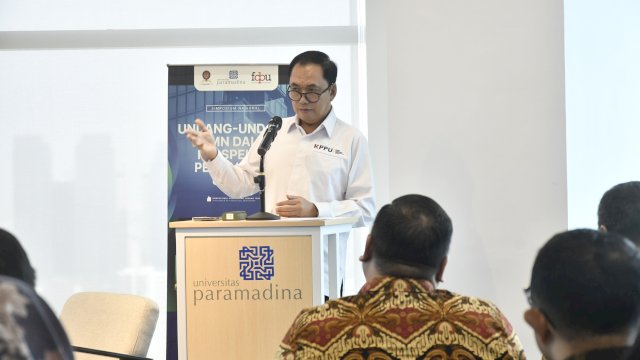 Ketua KPPU RI, M. Fanshurullah Asa, saat membuka Simposium Nasional, kemarin. (Dok. Humas KPPU) 