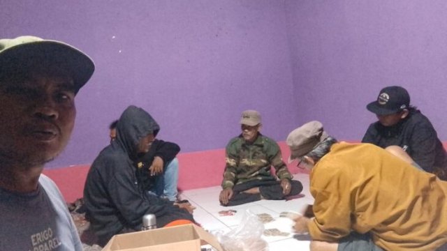 Kegiatan Siskamling di Salah Satu desa di Kukar. [IST]