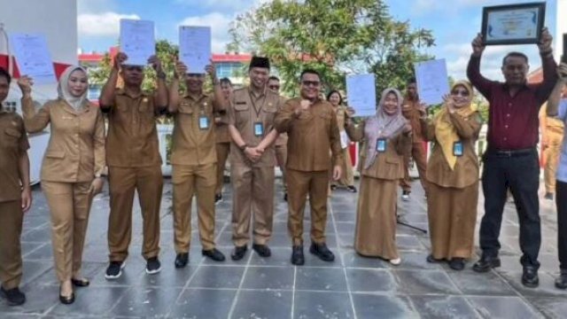 Penyerahan SK Purna Tugas, Kenaikan Pangkat, P3K di lingkup DPMD Kukar. [IST]