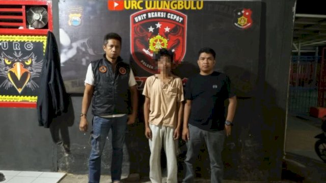 IL (23), terduga penyebar konten asusila milik seorang wanita saat diamankan pihak kepolisian di Bulukumba. [Ist]